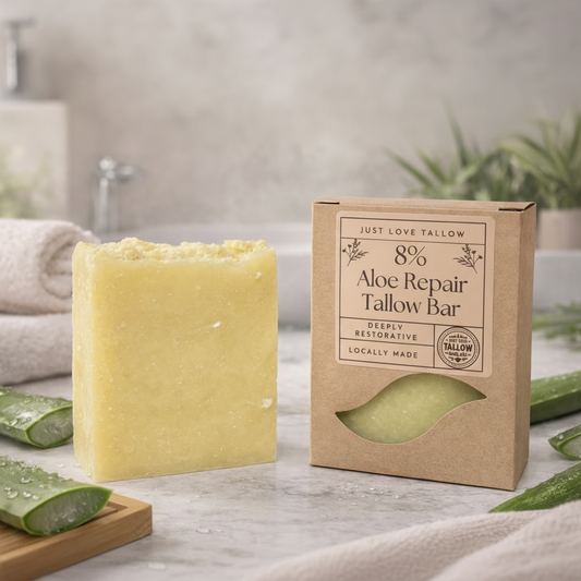 Aloe repair tallow bar soap with packaging on a neutral background